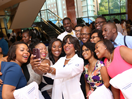 Dr. Valerie Montgomery Rice taking photos with entering Class of 2014 students