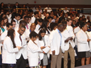 Entering Class of 2014 medical students reciting the “Medical Student Oath of Service and Responsibility”